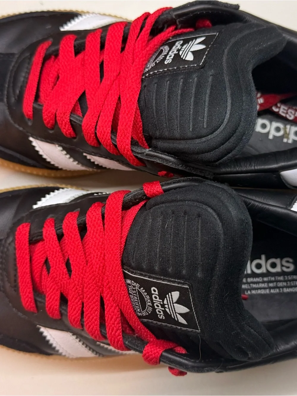 adidas  Black Sneakers with Red Laces and White Stripes